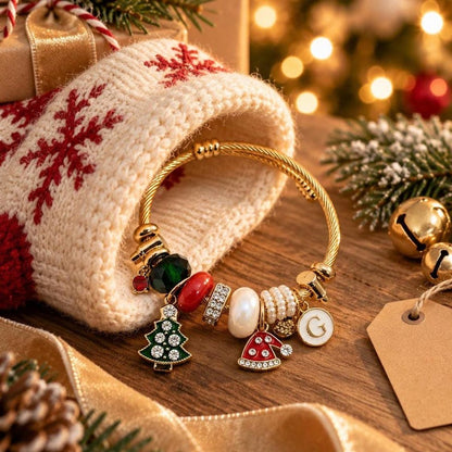 Close-up of Christmas charm bracelet initial charm