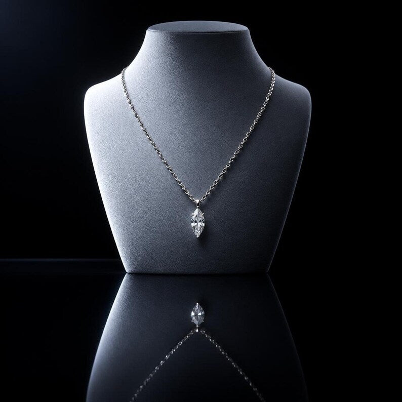 Marquise pendant necklace on dark bust display
